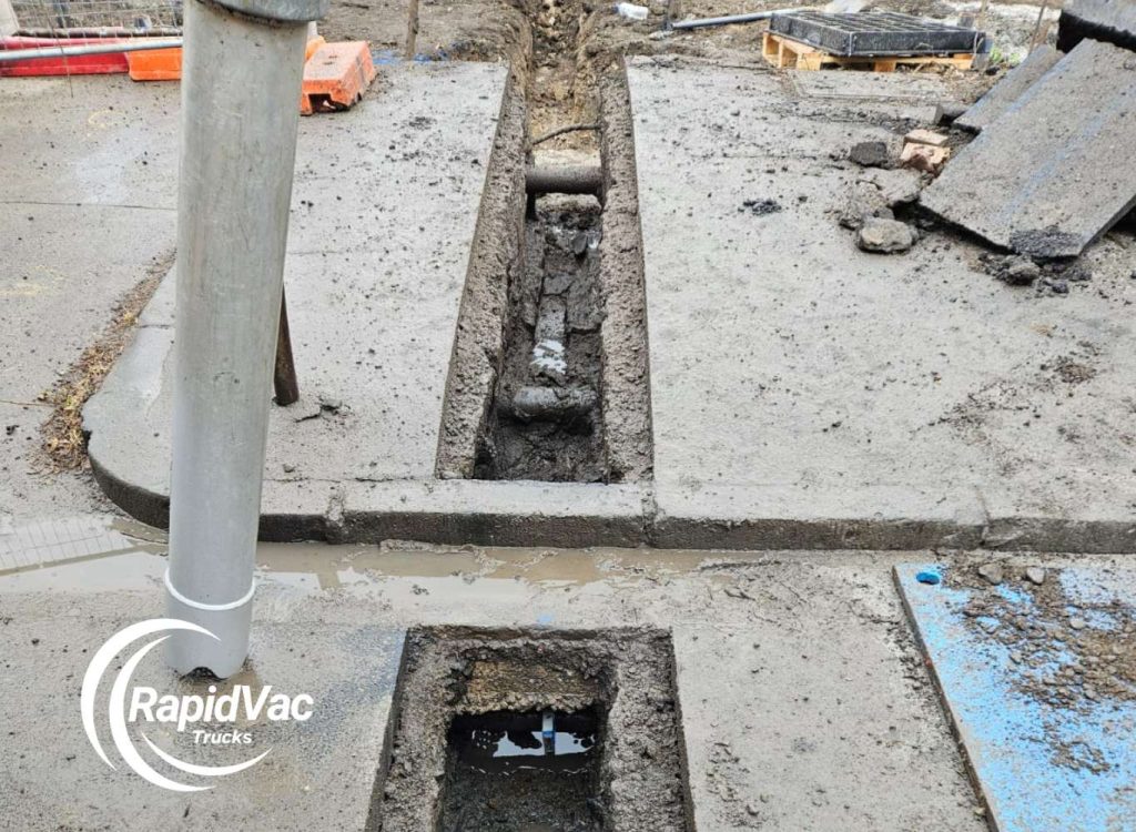 Trenching work using a vacuum truck for minimal ground disturbance in Brisbane.