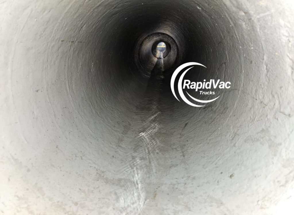 Vacuum excavation in Brisbane using advanced vac trucks for safe and precise digging and clearing dirt and slurry from pipe.